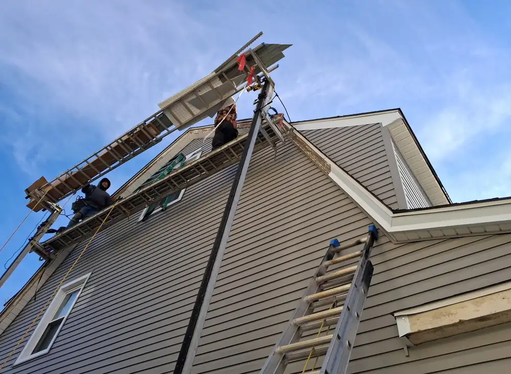 Iron Shore crew reroofing a home