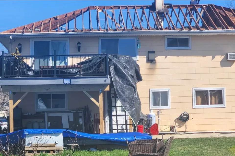 Roof tear-off in progress